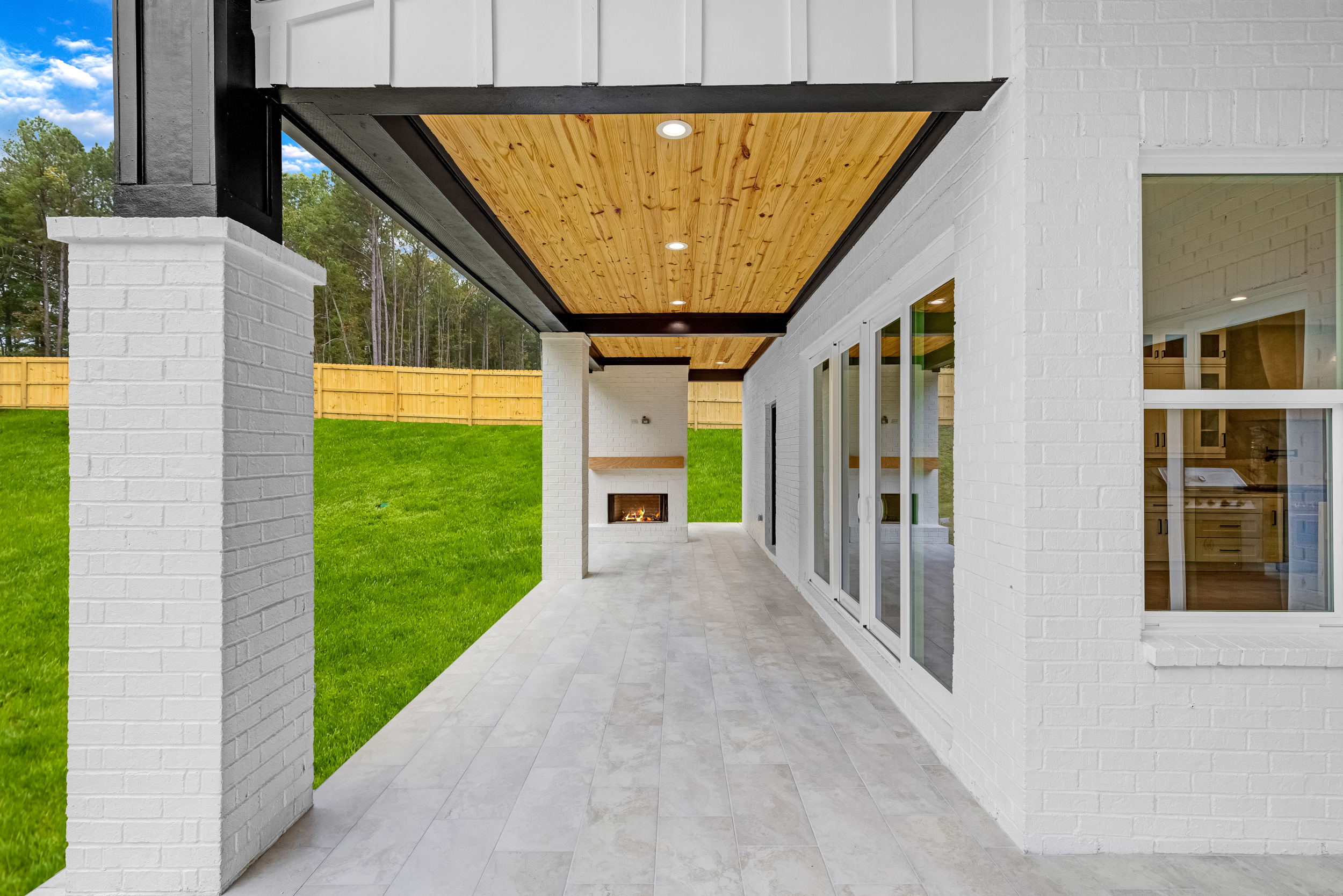 Covered rear patio with outdoor kitchen